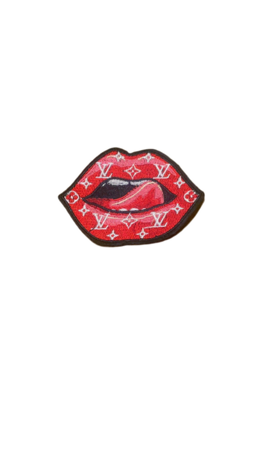 Small red lip patch